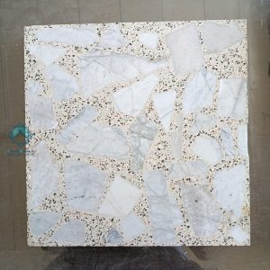 تصویر نمونه یک عدد خرید موزاییک لاشه سنگ سفید قرار گرفته بر روی زمین